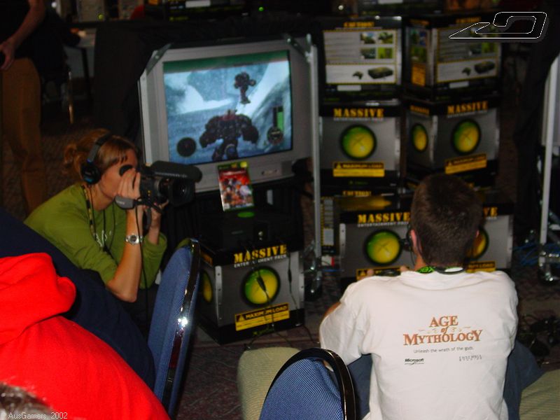 Fly TV chick filming gamers 
