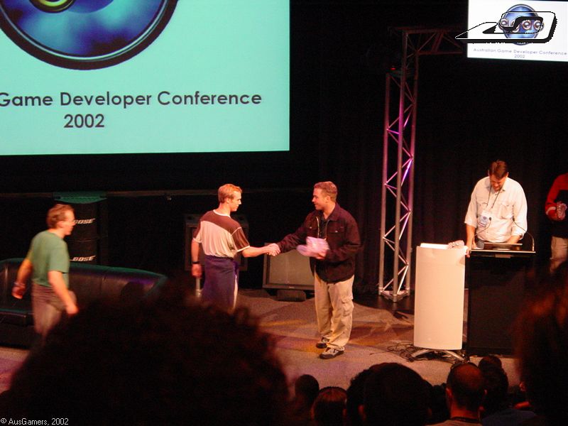 Prizes for competition winners being given out  
