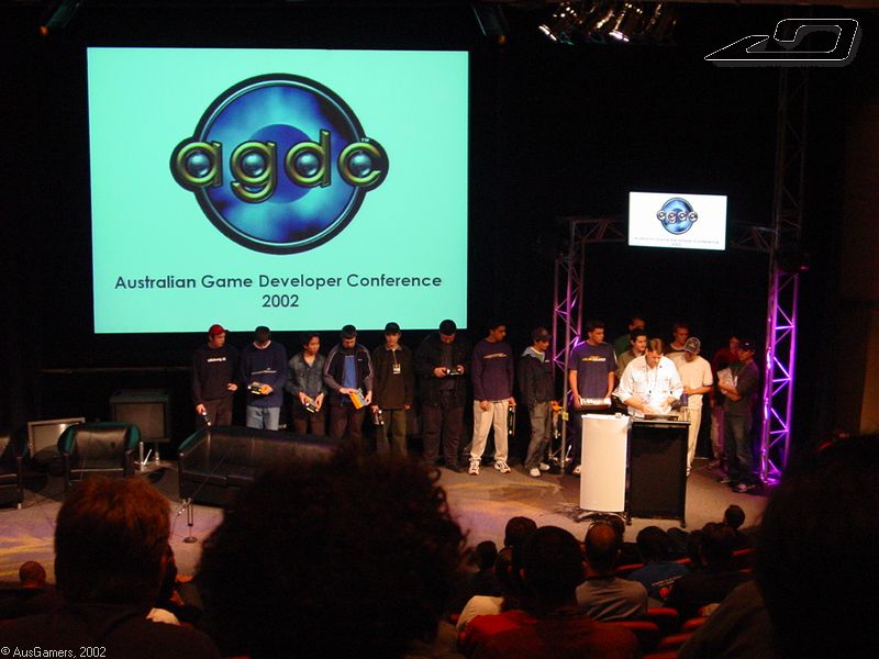 Trix and competition winners on stage 
